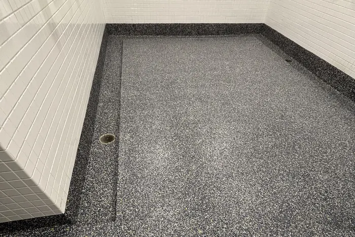 Athletic Locker Room — Penntek industrial flake system installed by Three Stone in Middle Tennessee