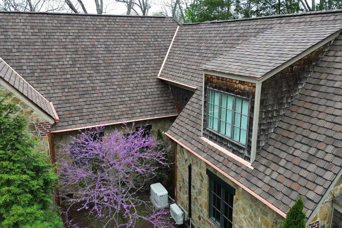 Copper Half-Round — Copper half-round and full-round gutters with copper gutter guards installed by Three Stone in Middle Tennessee