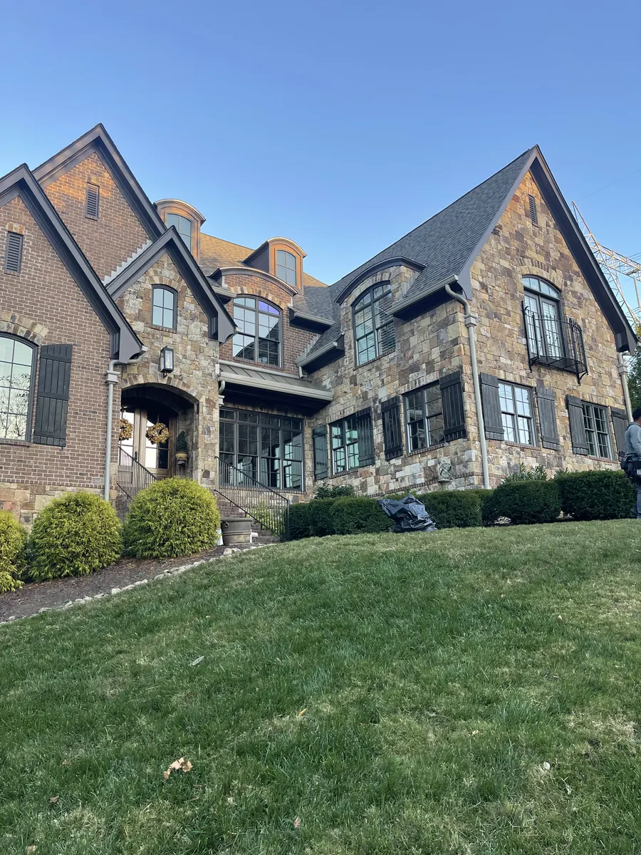 Full-Round Downspouts — 6" K-style seamless aluminum gutters with full-round downspouts by Three Stone in Middle Tennessee