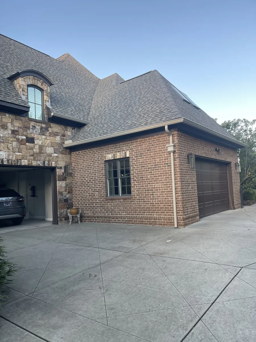 Full-Round Downspouts — 6" K-style seamless aluminum gutters with full-round downspouts by Three Stone in Middle Tennessee