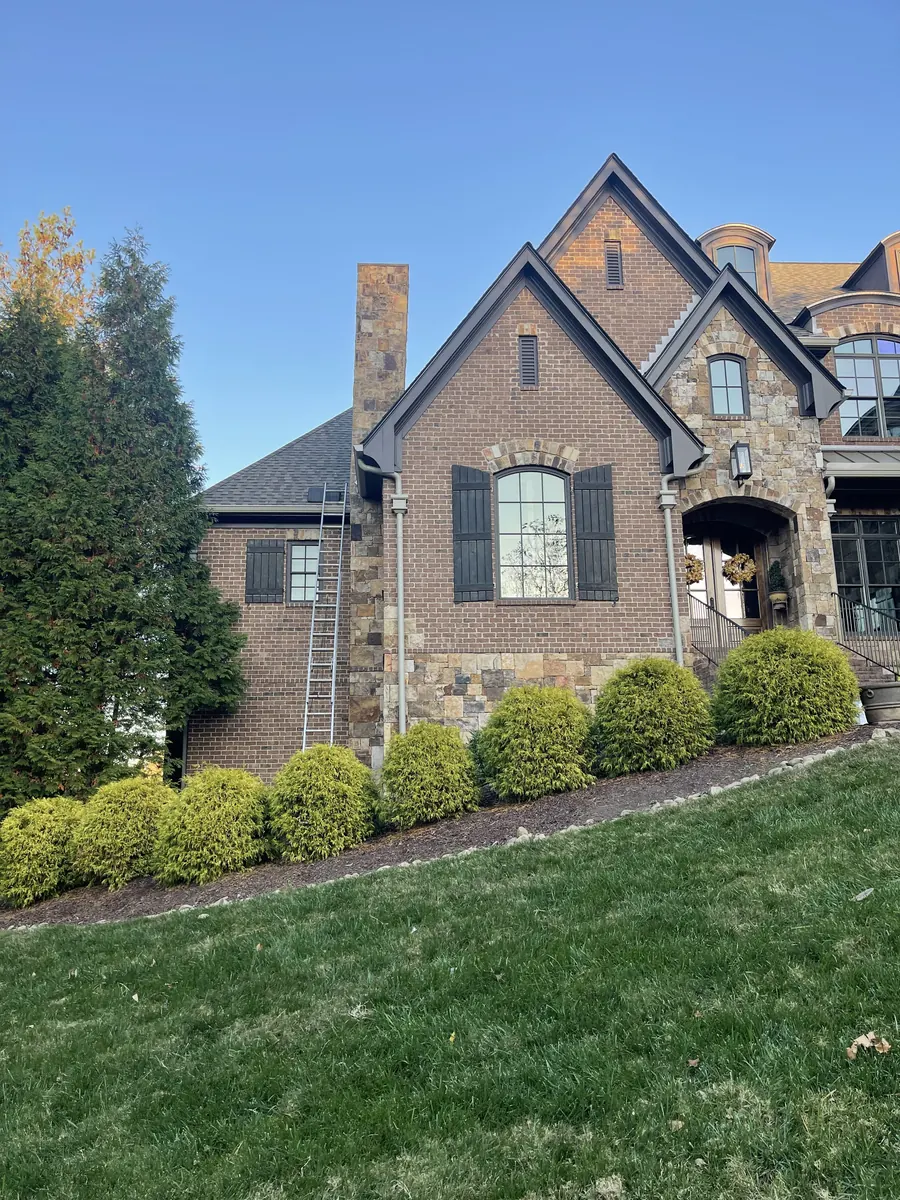 Full-Round Downspouts — 6" K-style seamless aluminum gutters with full-round downspouts by Three Stone in Middle Tennessee