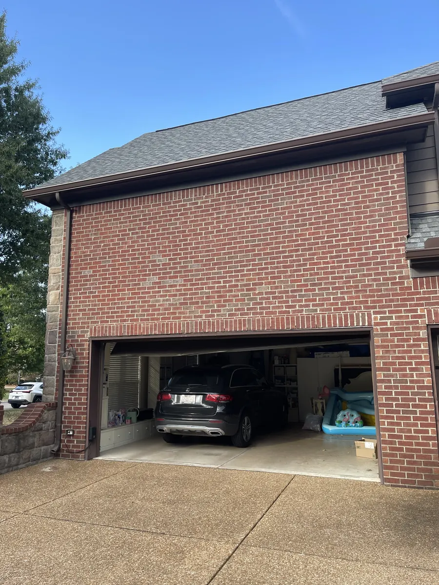 Red Brick Home, Spectra K-Style — Spectra Metals 6" K-style gutters and downspouts by Three Stone in Middle Tennessee
