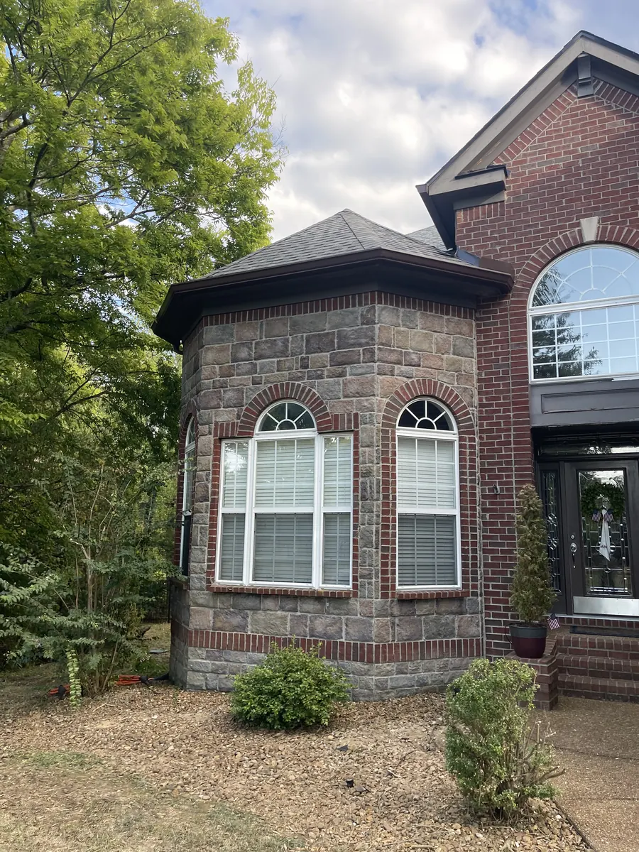 Red Brick Home, Spectra K-Style — Spectra Metals 6" K-style gutters and downspouts by Three Stone in Middle Tennessee