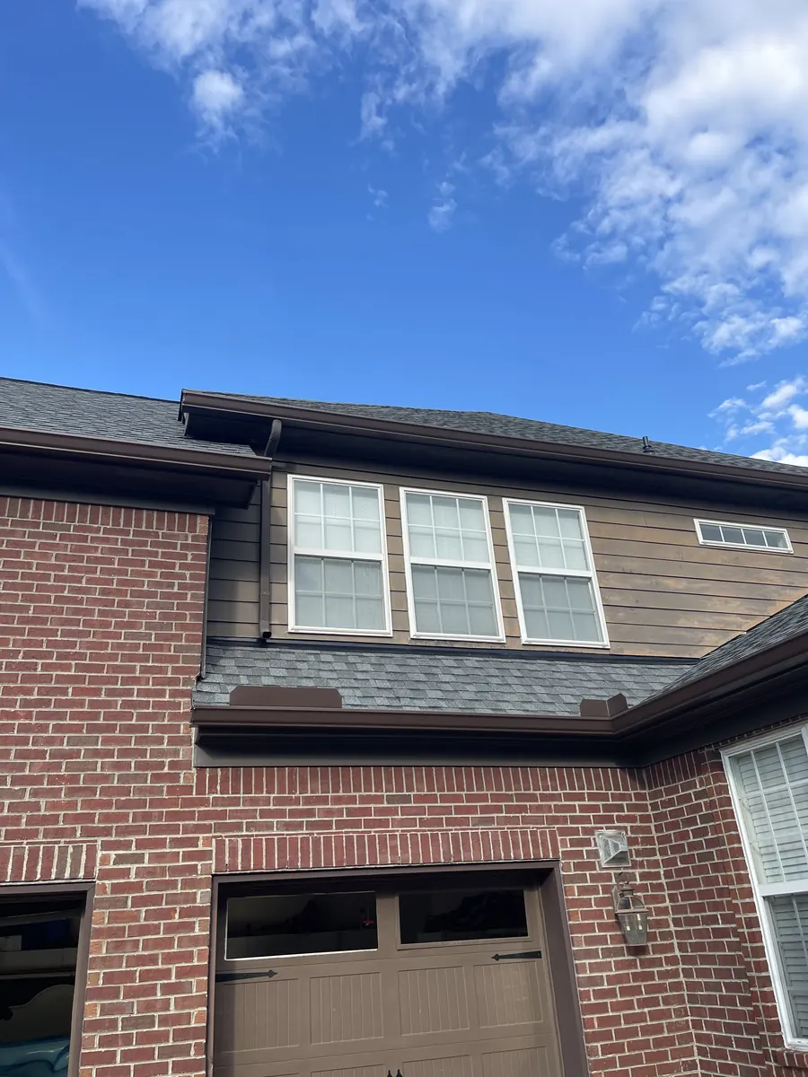 Red Brick Home, Spectra K-Style — Spectra Metals 6" K-style gutters and downspouts by Three Stone in Middle Tennessee