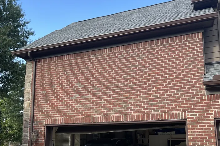 Red Brick Home, Spectra K-Style — Spectra Metals 6" K-style gutters and downspouts installed by Three Stone in Middle Tennessee
