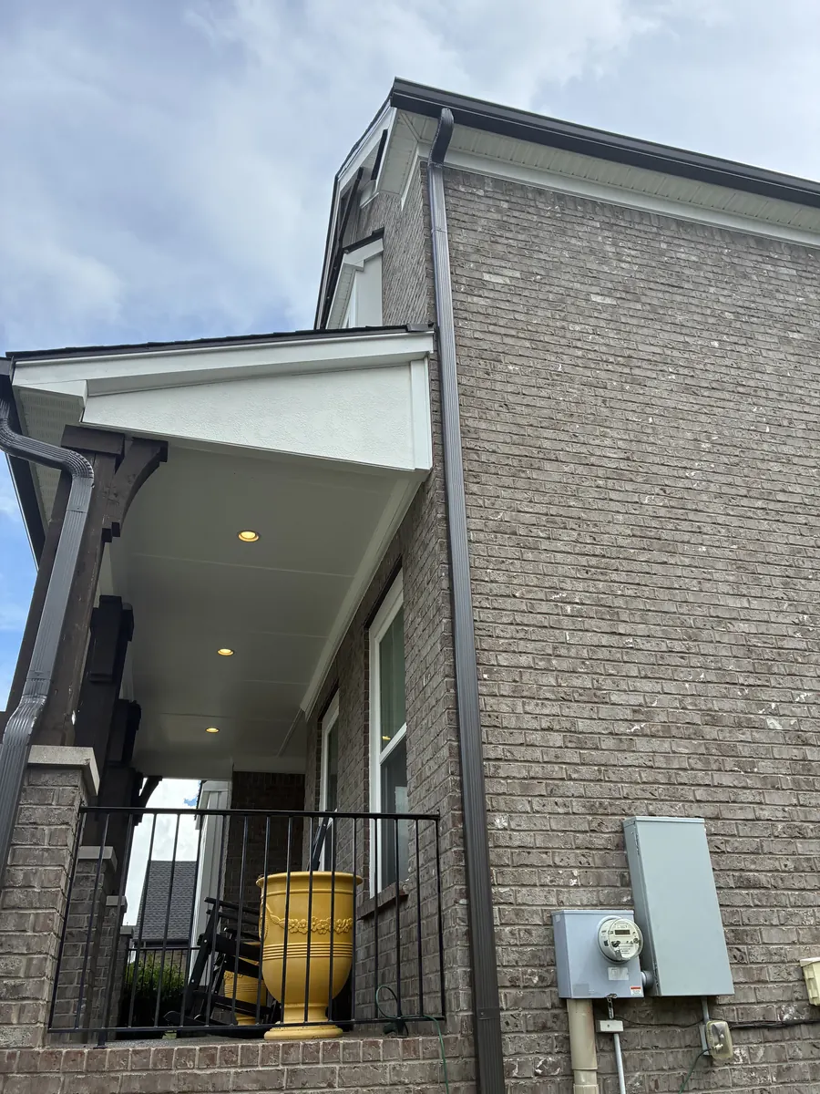 Tan Brick Home, Spectra K-Style — Spectra Metals 6" K-style gutters and downspouts by Three Stone in Middle Tennessee