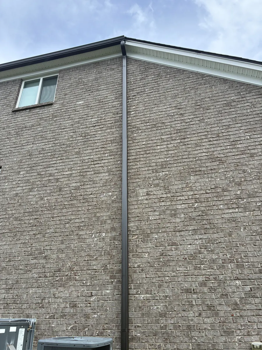 Tan Brick Home, Spectra K-Style — Spectra Metals 6" K-style gutters and downspouts by Three Stone in Middle Tennessee
