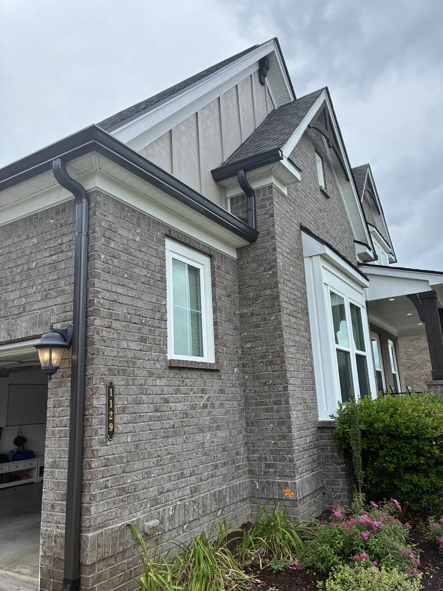 Tan Brick Home, Spectra K-Style — Spectra Metals 6" K-style gutters and downspouts by Three Stone in Middle Tennessee