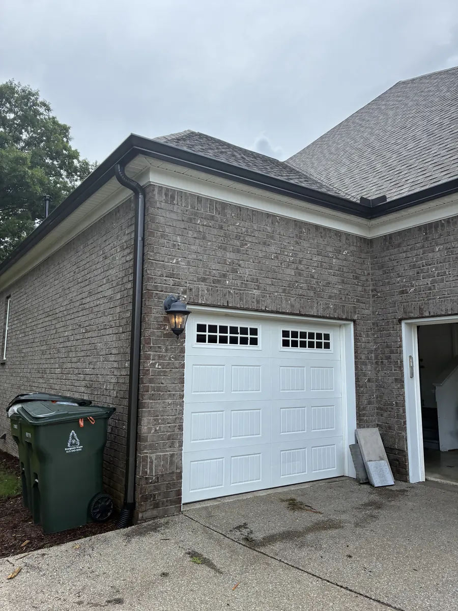 Tan Brick Home, Spectra K-Style — Spectra Metals 6" K-style gutters and downspouts by Three Stone in Middle Tennessee
