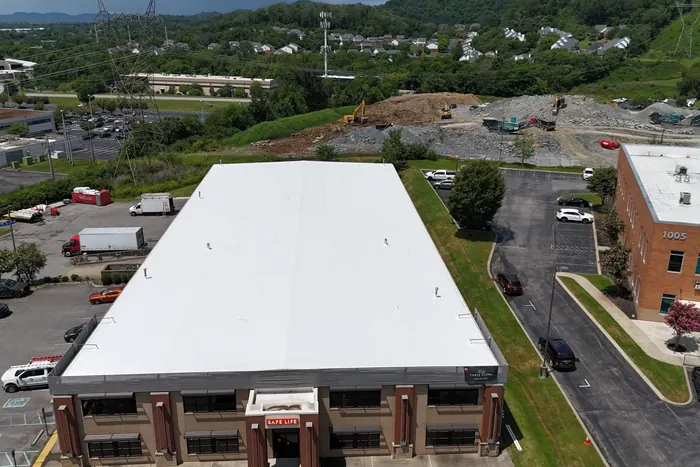 Core O Med — Carlisle SynTec TPO metal retrofit roof installed by Three Stone in Middle Tennessee