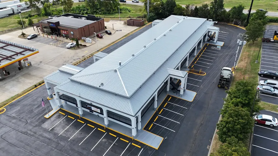 Econo Lodge — R-panel metal roof replacement roof by Three Stone in Middle Tennessee