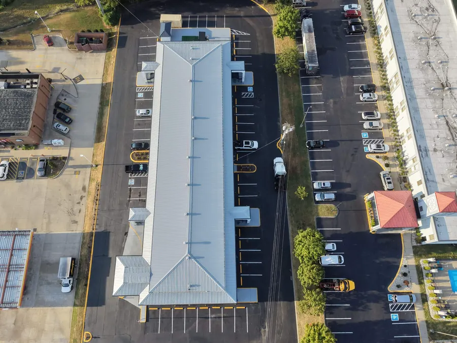 Econo Lodge — R-panel metal roof replacement roof by Three Stone in Middle Tennessee