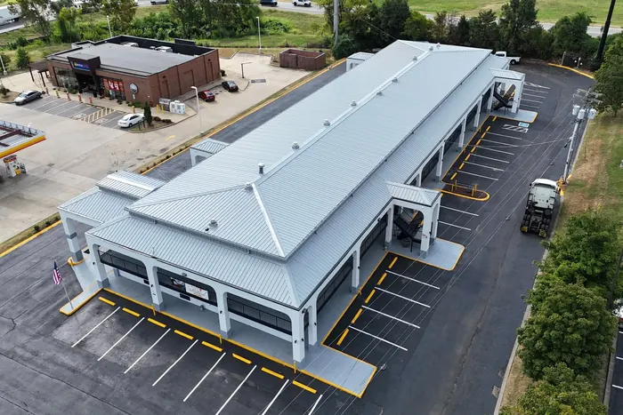 Econo Lodge — R-panel metal roof replacement roof installed by Three Stone in Middle Tennessee