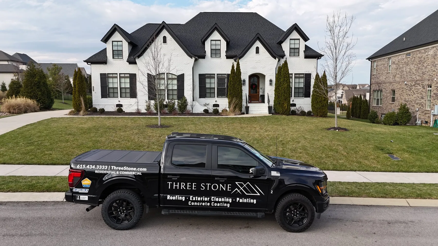 A Three Stone truck parked outside a home in Franklin, Tennessee