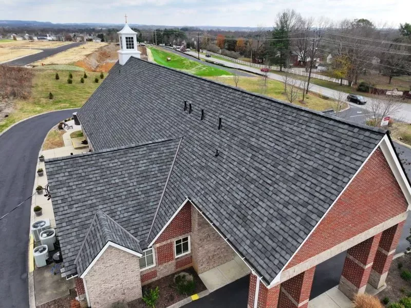 Completed architectural shingle roof by Three Stone on a church in Middle Tennessee